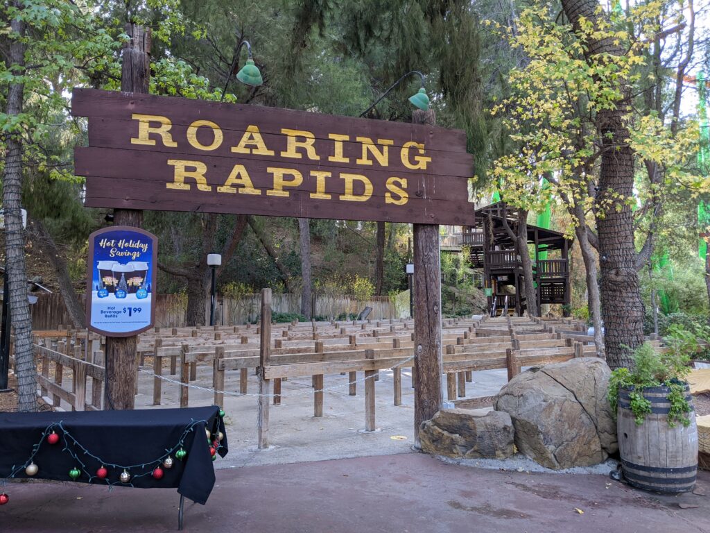 Ride Roaring Rapids water ride at Six Flags Magic Mountain amusement park
