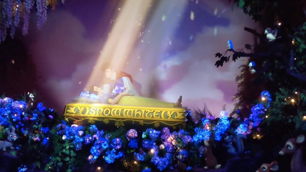 Ride the Snow White's Enchanted Wish dark ride at Disneyland